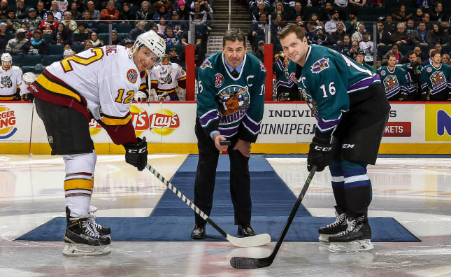 (L to R): Chicago Wolves Captain Phil Cannone, 1996-97 Moose Captain Randy Gilhen and current Moose Captain John Albert